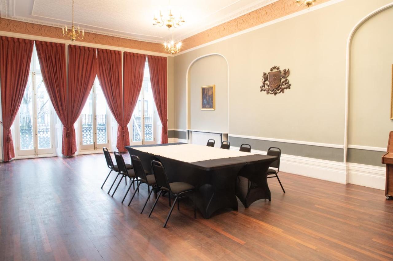 a conference room with a table and chairs at 72QT in London